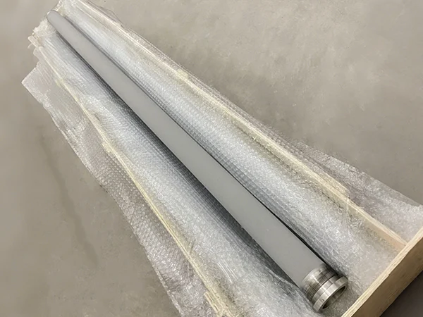 A single asymmetric metal membrane filter element packed in a wooden crate