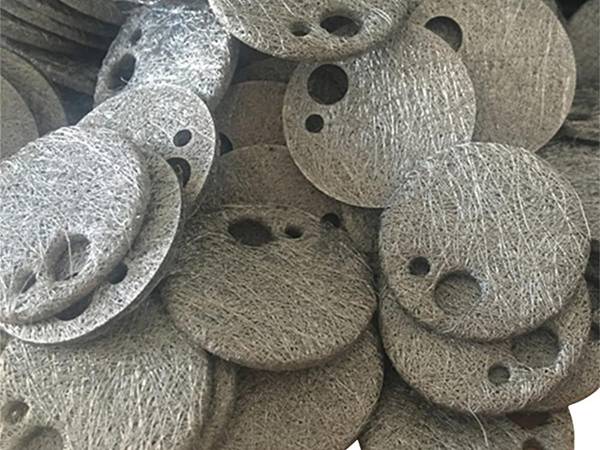 Multiple FeCrAl sintered fiber felts each with 2 holes of different sizes